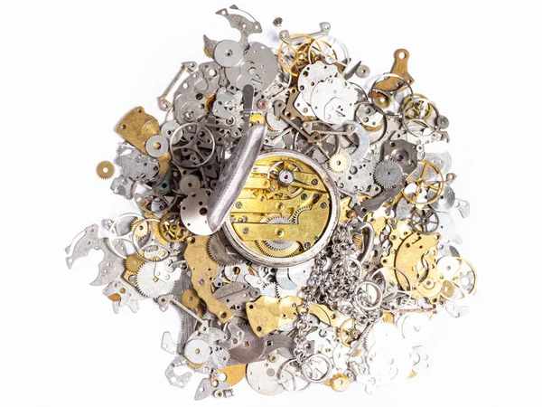 Top view of pocket watch on pile of spare parts — Stock Photo, Image