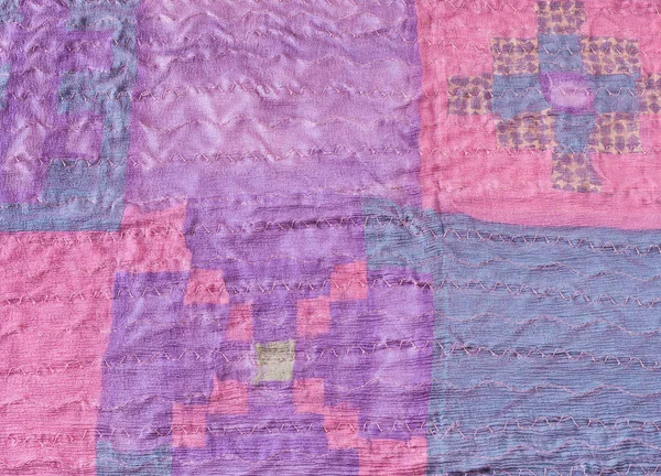 Stitched pieces of silk fabric in patchwork scarf — Stock Photo, Image