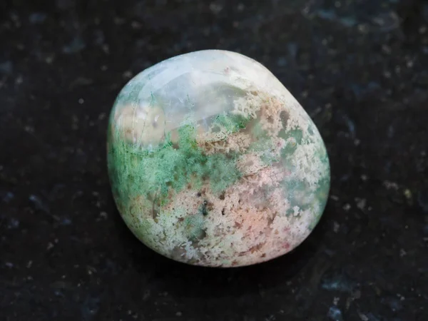 Polished Moss Agate gemstone on dark — Stock Photo, Image