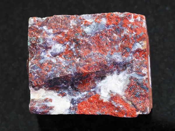 Rough Jasper stone on dark background — Stock Photo, Image
