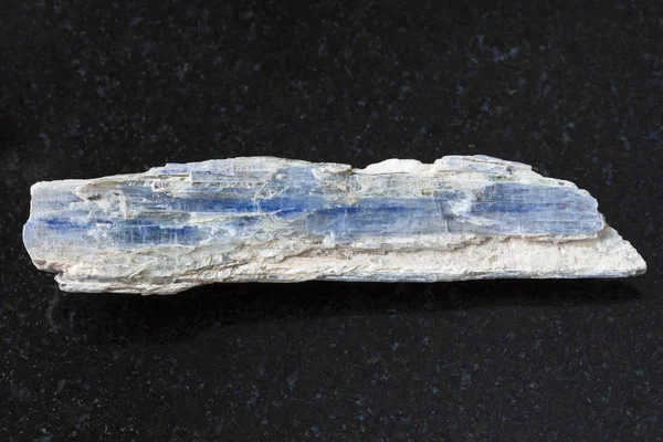 Rough blue kyanite stone on dark — Stock Photo, Image