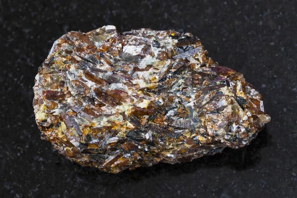 Rough Titanite stone on dark background — Stock Photo, Image