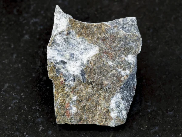 Rough Andesite stone on dark background — Stock Photo, Image