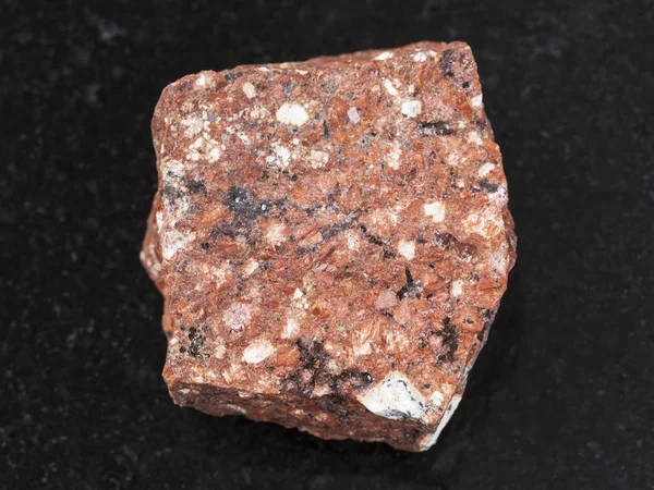 Raw Dacite stone on dark background — Stock Photo, Image