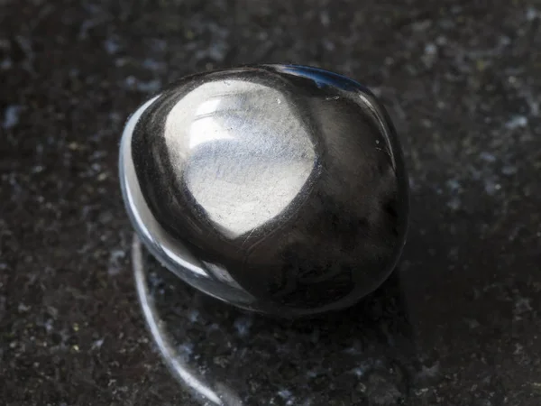 Polished Gagate (Jet) gem stone on dark — Stock Photo, Image