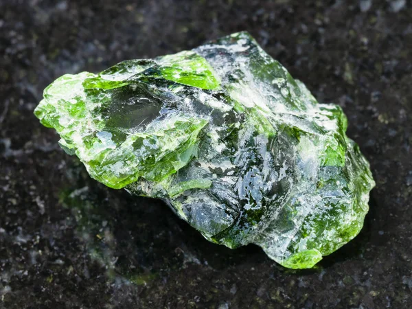 Raw crystal of Chrome Diopside gemstone on dark — Stock Photo, Image