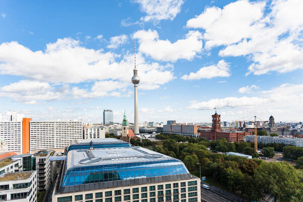 BERLIN, GERMANY - SEPTEMBER 13, 2017: Berlin city skyline with TV tower and Rotes Rathaus (Red City Hall) from Berliner Dom in september. Berlin is the capital and the largest city of Germany