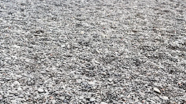 Pebble on surface of Reynisfjara beach in Iceland — Stock Photo, Image