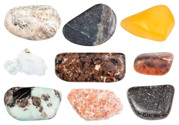 Set aus verschiedenen polierten Steinen isoliert auf weiß — Stockfoto