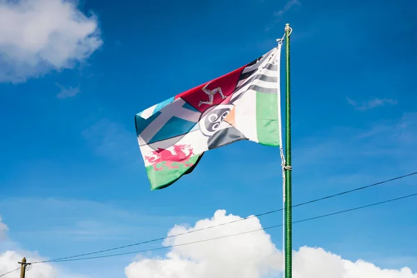 View of pan-celtic flag with blue sky in Brittany — Stock Photo, Image