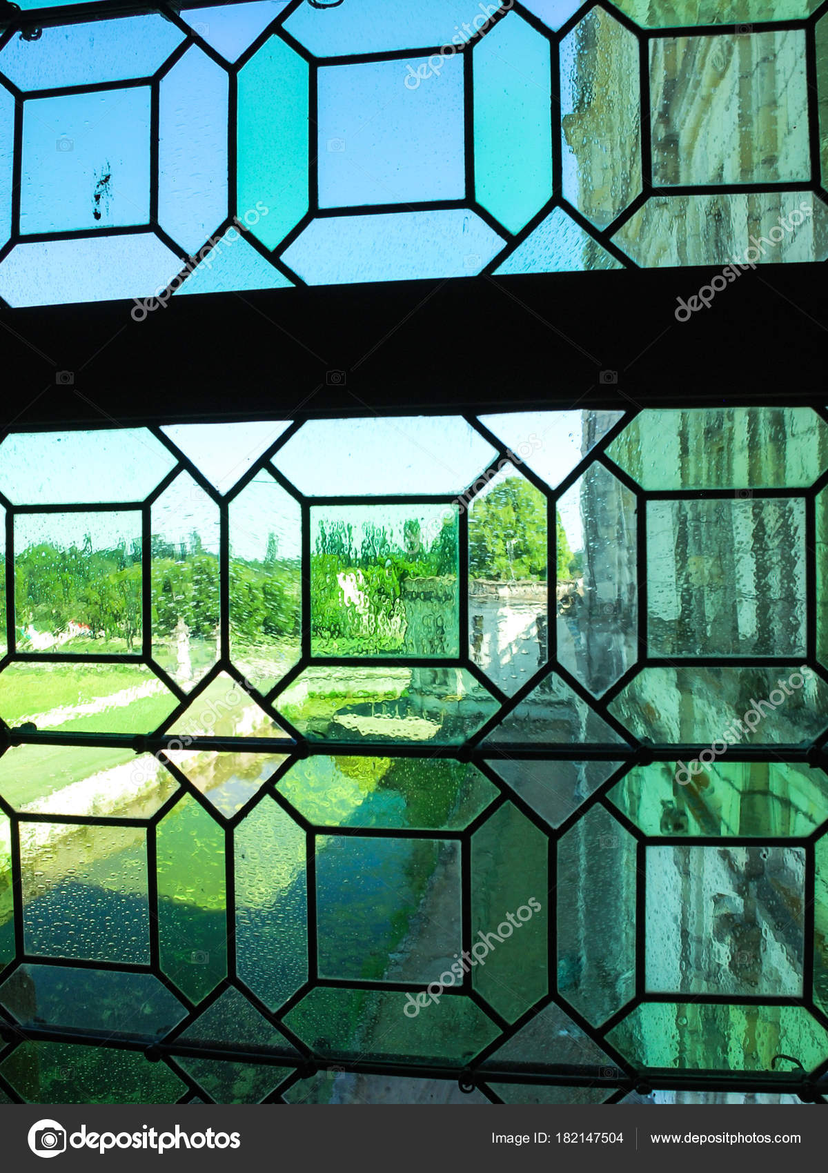Green stainedglass window in castle Chateau de Chambord Stock