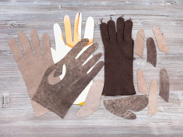 Set of items for glove production on table — Stock Photo, Image