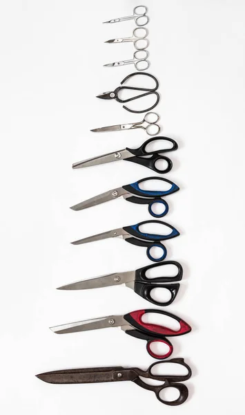 Top view of column from various scissors — Stock Photo, Image