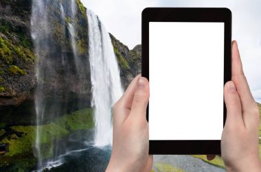 Fotoğraf Seljalandsfoss su turist düşmek