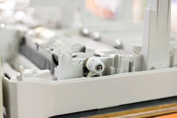 Plastic gears in an assembling new printer — Stock Photo, Image