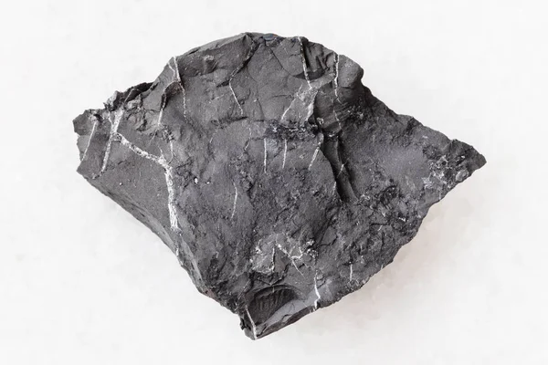 ham shungite şeyl beyaz taşa