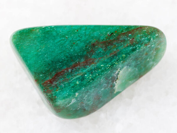 fuchsite (chrome mica) gemstone with hematite vein