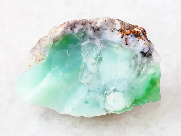 Rough crystal of Chrysoprase gemstone on white — Stock Photo, Image