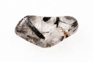 tumbled quartz stone with Tourmaline crystals clipart