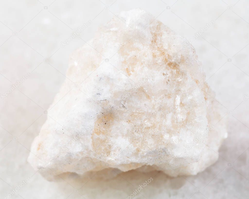 rough anhydrite stone on white
