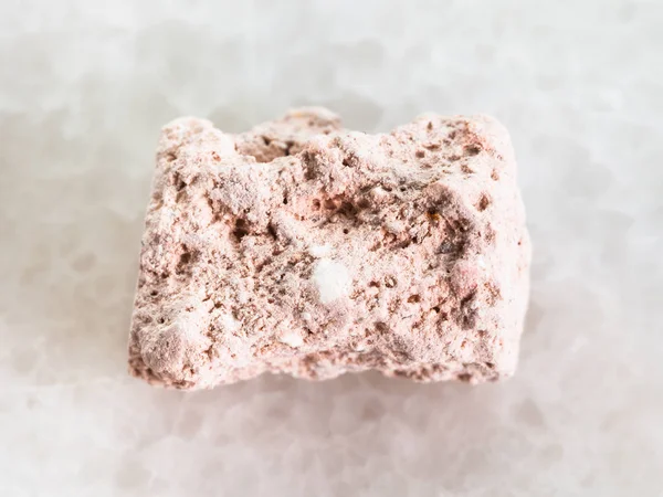Rough Kaolinite stone on white marble — Stock Photo, Image