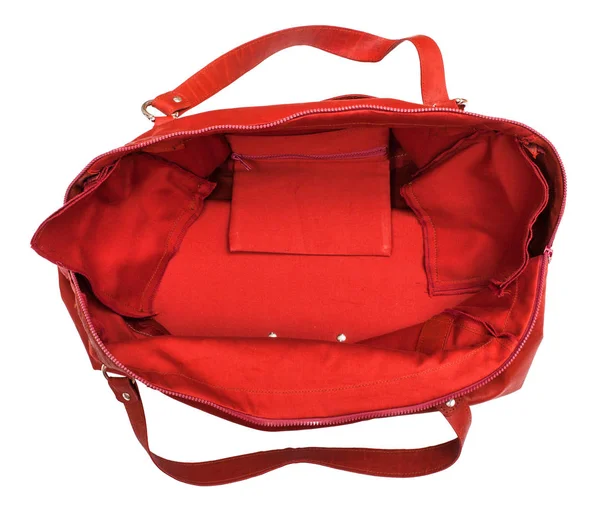 Ovanifrån av öppen tom rött reser väska isolerade — Stockfoto