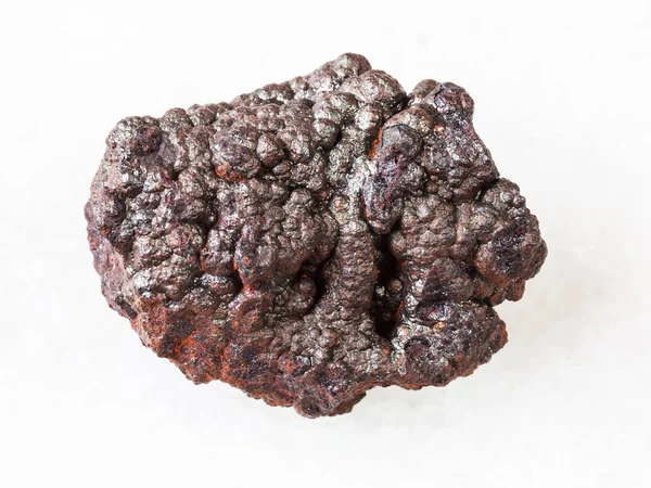 Rough Goethite stone (brown iron) on white — Stock Photo, Image