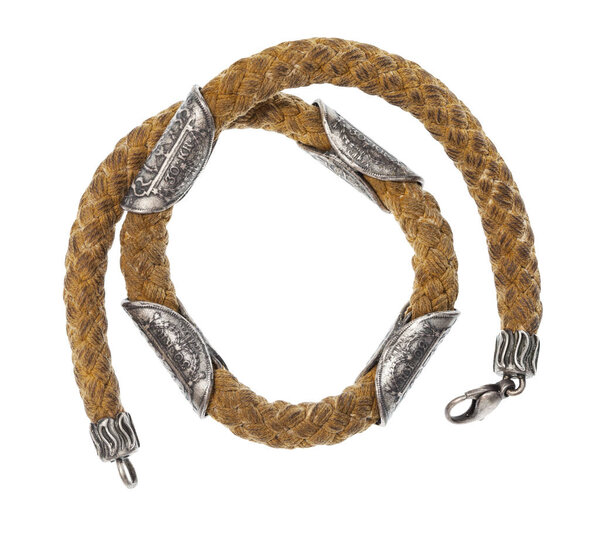 coiled necklace with ancient silver coins isolated