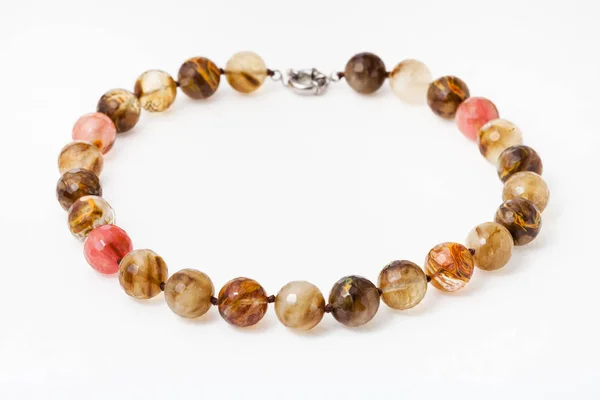 Necklace from translucent agate gemsones on white — Stock Photo, Image