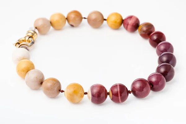 Necklace from polished natural australian mookaite — Stock Photo, Image