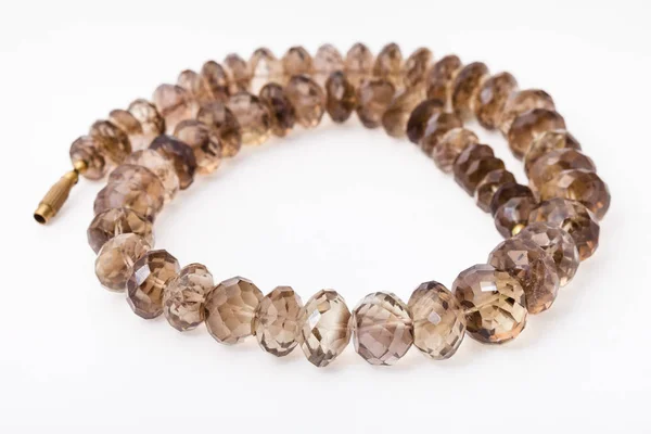 Spiral necklace from faceted Smoky quartz gems — Stock Photo, Image