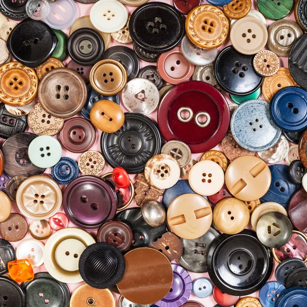 Vista superior de la pila de muchos botones diferentes —  Fotos de Stock