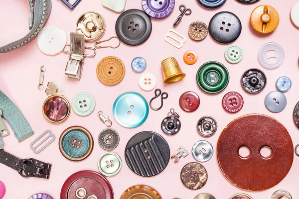 Many various sewing items on pink background — Stock Photo, Image