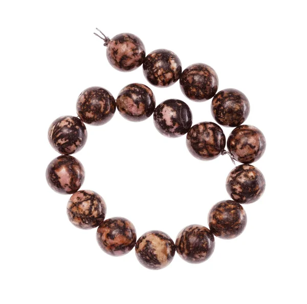 Cuerda enrollada de perlas de piedras preciosas de rodonita —  Fotos de Stock