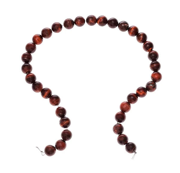Beads from natural polished bull's eye gemstone — Stock Photo, Image