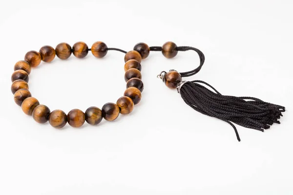 Worry beads from tiger's eye gemstones on white — Stock Photo, Image