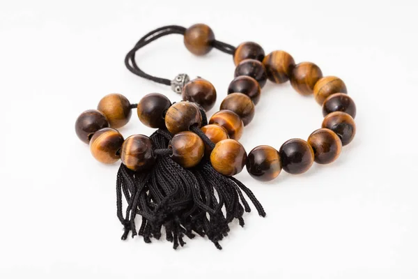 Tangled worry beads from tiger's eye gemstones — Stock Photo, Image