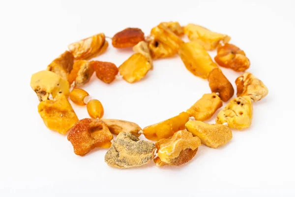 Tangled necklace from natural raw yellow amber — Stock Photo, Image