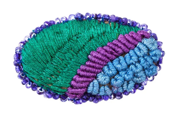 Broche oval bordado por varios hilos de seda —  Fotos de Stock