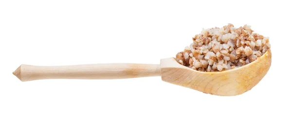 Buckwheat porridge in wooden spoon isolated — Stock Photo, Image