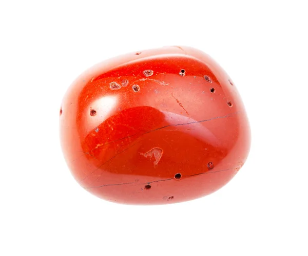 Полированный красный коралловый драгоценный камень, изолированный на белом — стоковое фото