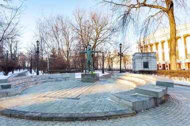 MOSCOW, RUSSIA - FEBRUARY 8, 2020: Strastnoy boulevard near Petrovsky Gates Square (Peter's Gate Square) and building of Moscow City Duma (Russian regional parliament in Moscow) in winter morning.