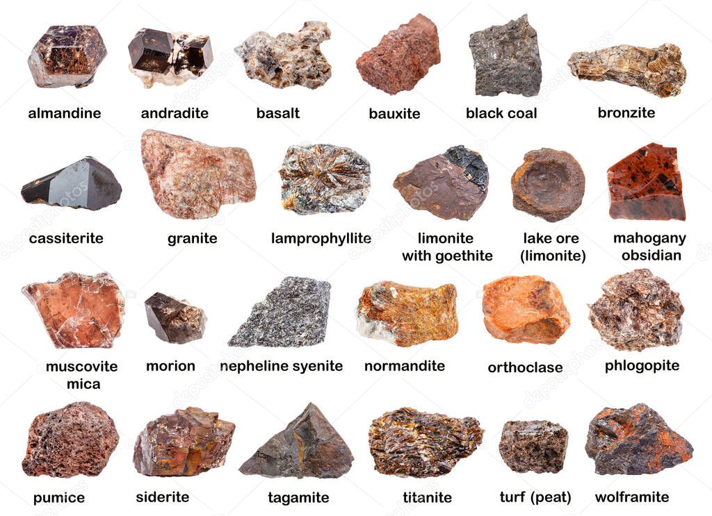 set of various brown unpolished rocks with names ( almandine, wolframite, morion, cassiterite, nepheline syenite, phlogopite, orthoclase, lamprophyllite, normandite, tagamite, etc) isolated on white