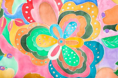 Çiçek deseninin ayrıntıları ipek eşarpla çizilmiş soğuk kontur batik tekniğiyle.