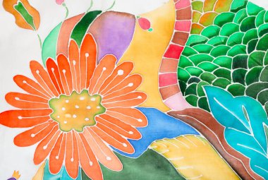 Batik tekniğiyle ipek eşarba elle çizilmiş çiçek süsü ayrıntıları.