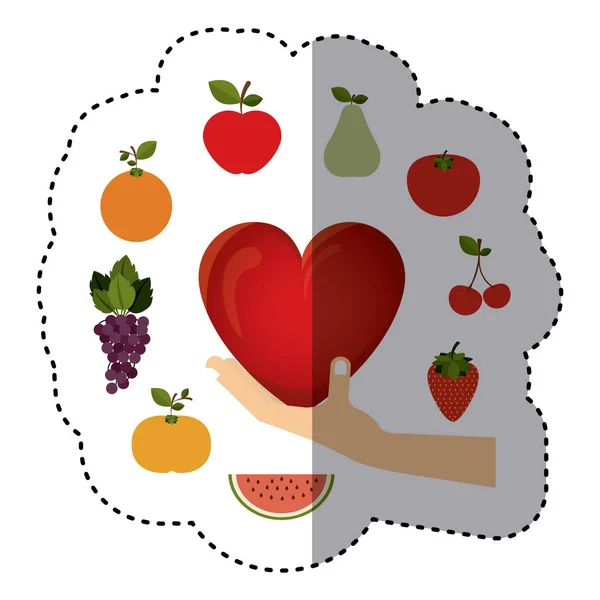 Autocollant coloré de main tenant un coeur avec bordure de fruits — Image vectorielle