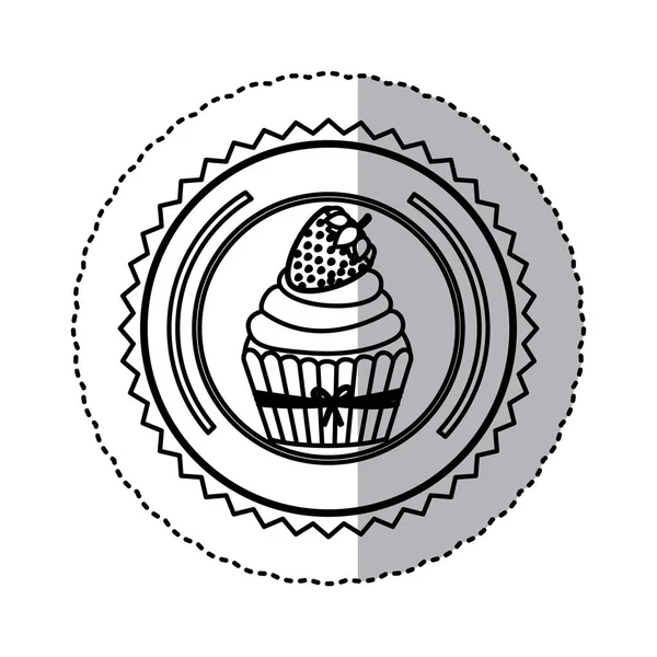 Black contour silhouette sticker with cupcake with strawberry in round frame — Stock Vector