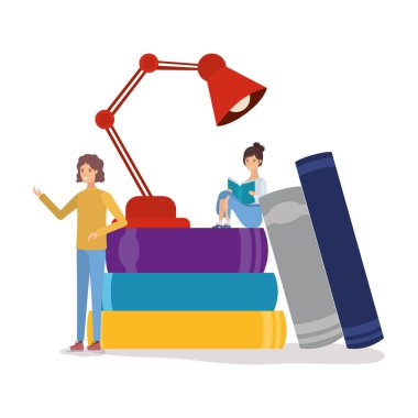 Bir grup kız öğrenci kitap okuyor.