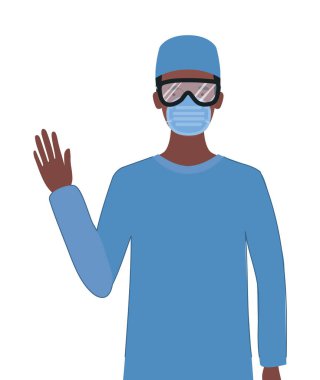 Üniformalı maskeli ve gözlüklü bir doktor.