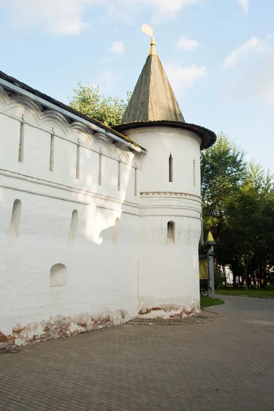 Tower of old white stone monastery — Stock Photo, Image